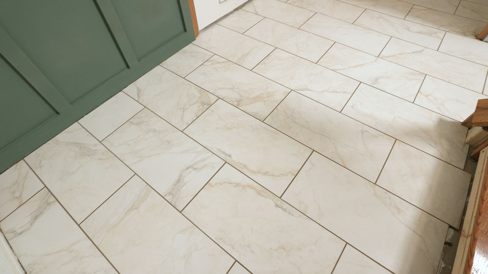 entryway with freshly laid tile